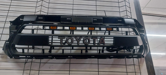 Parilla para Tacoma con cuartos en ambar  2012 - 2015